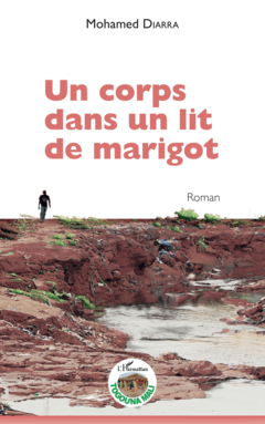 Un corps dans un lit de marigot